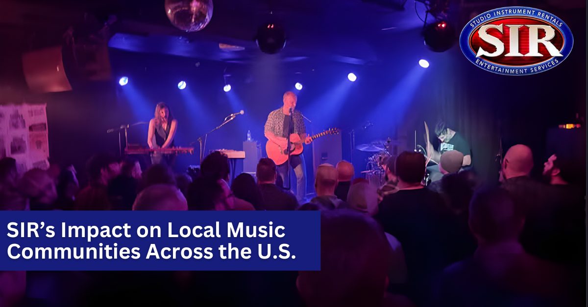 A lively crowd at a music venue enjoying a live performance by a band.